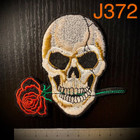 Skull with a Flower Iron On Patch