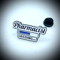 An enamel pin saying pharmacist loading…